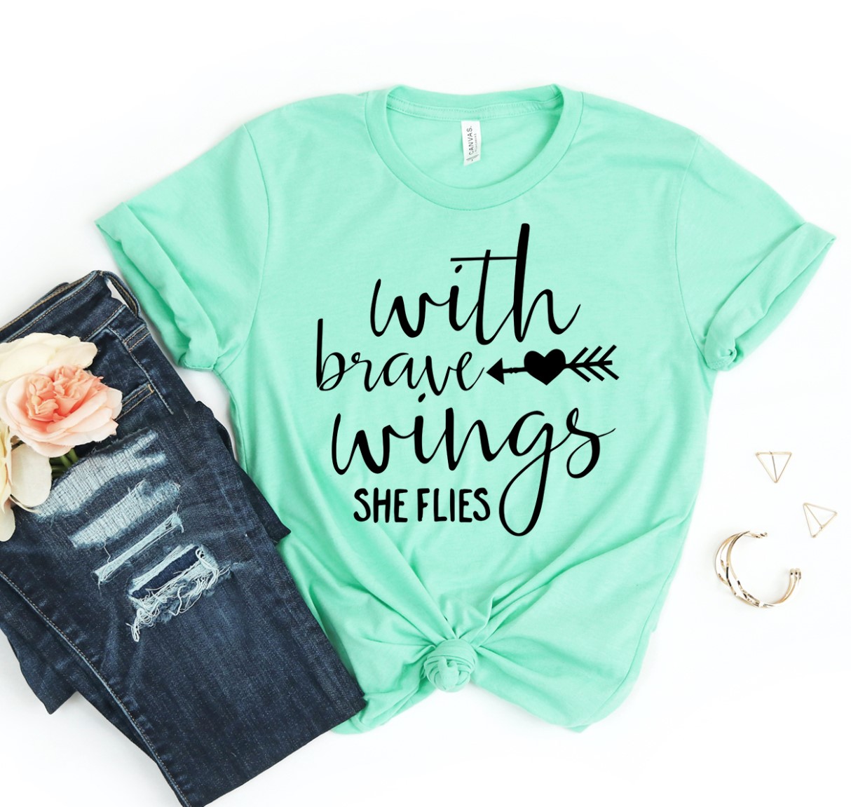 With Brave Wings She Flies T-shirt made of soft ring spun cotton with a vibrant flex print design.