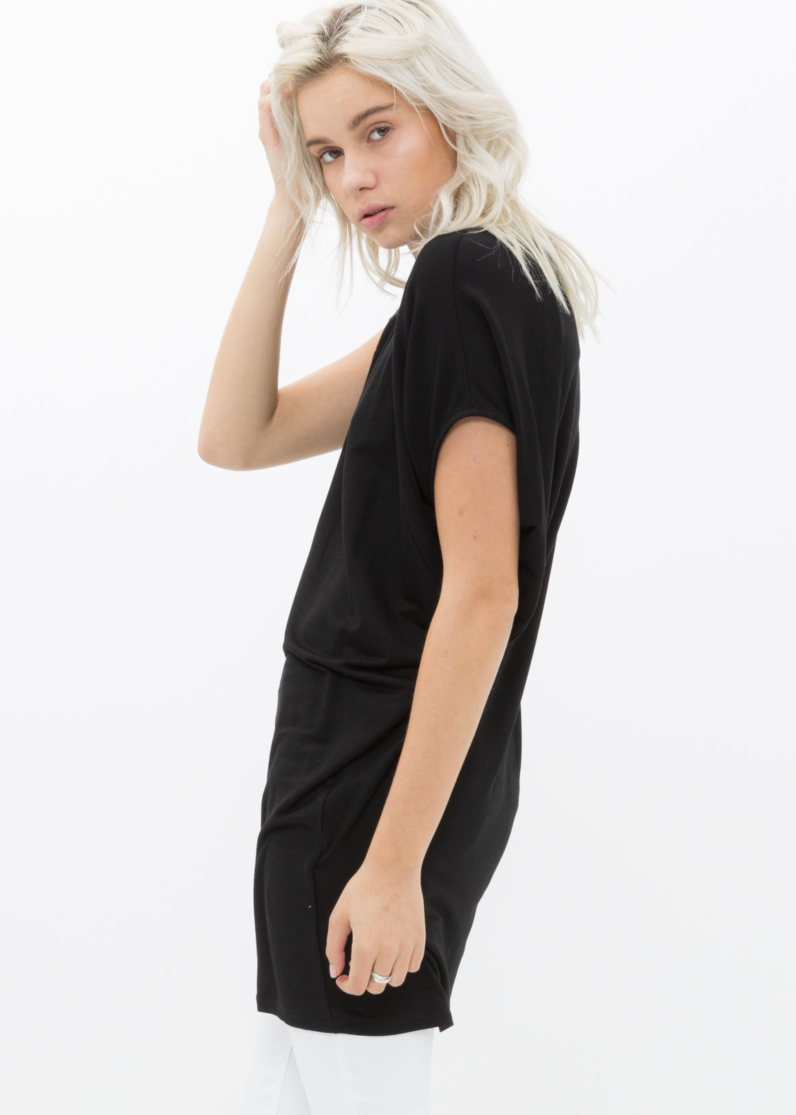 A stylish Women's Asymmetric Drape Tee featuring a unique draped design, made from a soft rayon and spandex blend, perfect for casual wear.