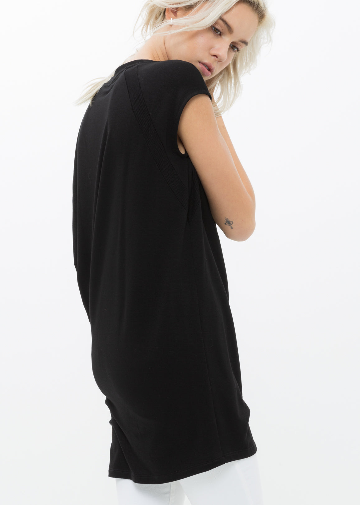 A stylish Women's Asymmetric Drape Tee featuring a unique draped design, made from a soft rayon and spandex blend, perfect for casual wear.