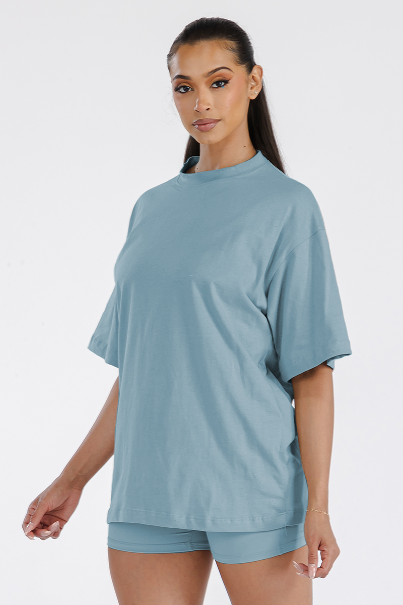 A stylish Women's Boyfriend Oversized Drop Shoulder Tee in soft cotton, featuring a round neck and drop shoulder design, perfect for workouts or lounging.