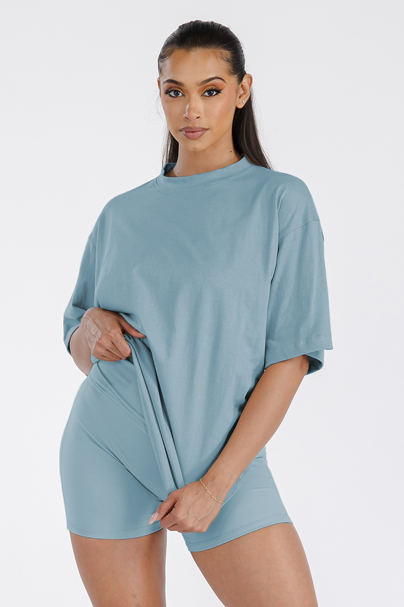 A stylish Women's Boyfriend Oversized Drop Shoulder Tee in soft cotton, featuring a round neck and drop shoulder design, perfect for workouts or lounging.