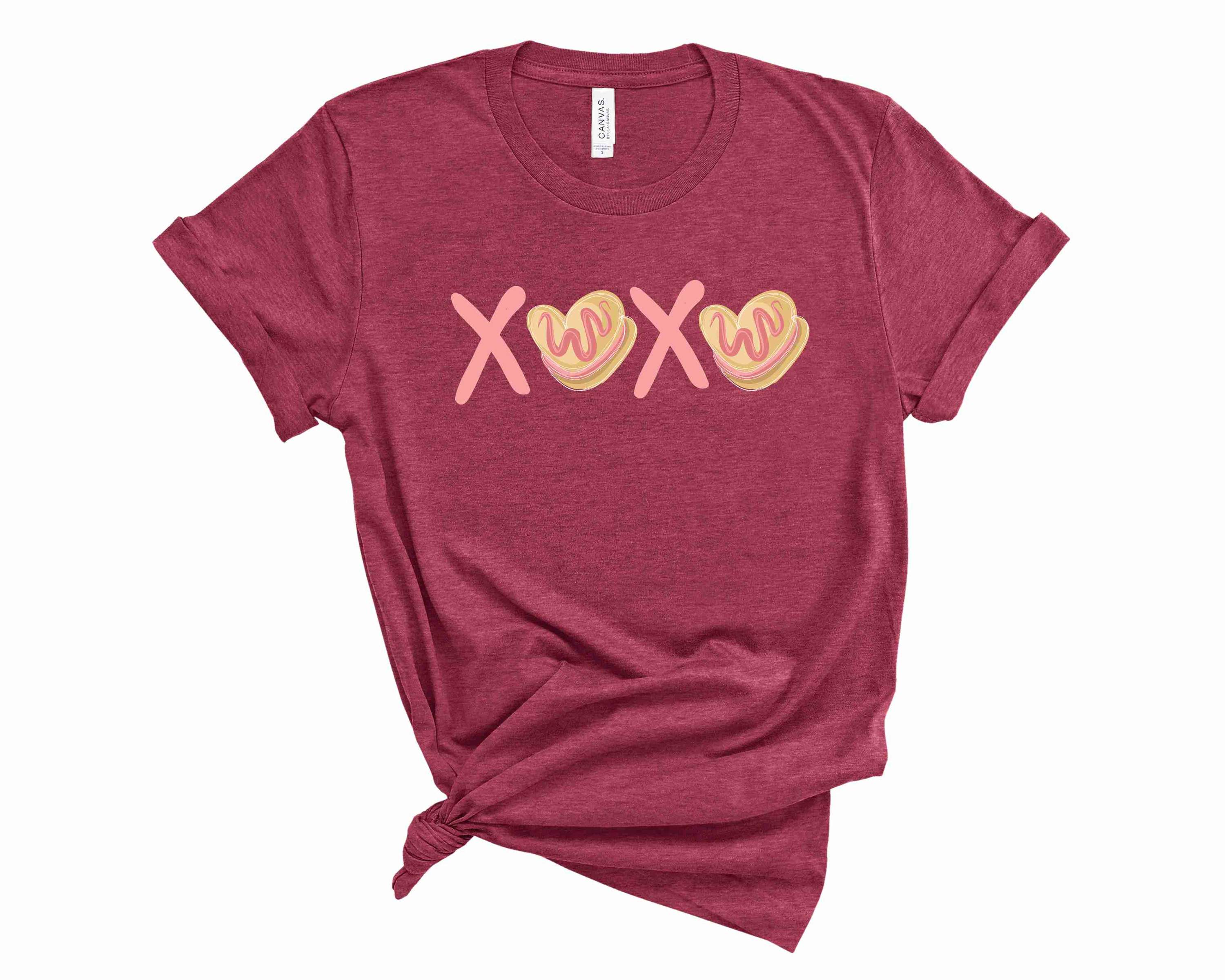 A unisex graphic tee featuring the XO Cookies design, showcasing vibrant colors and a comfortable fit.