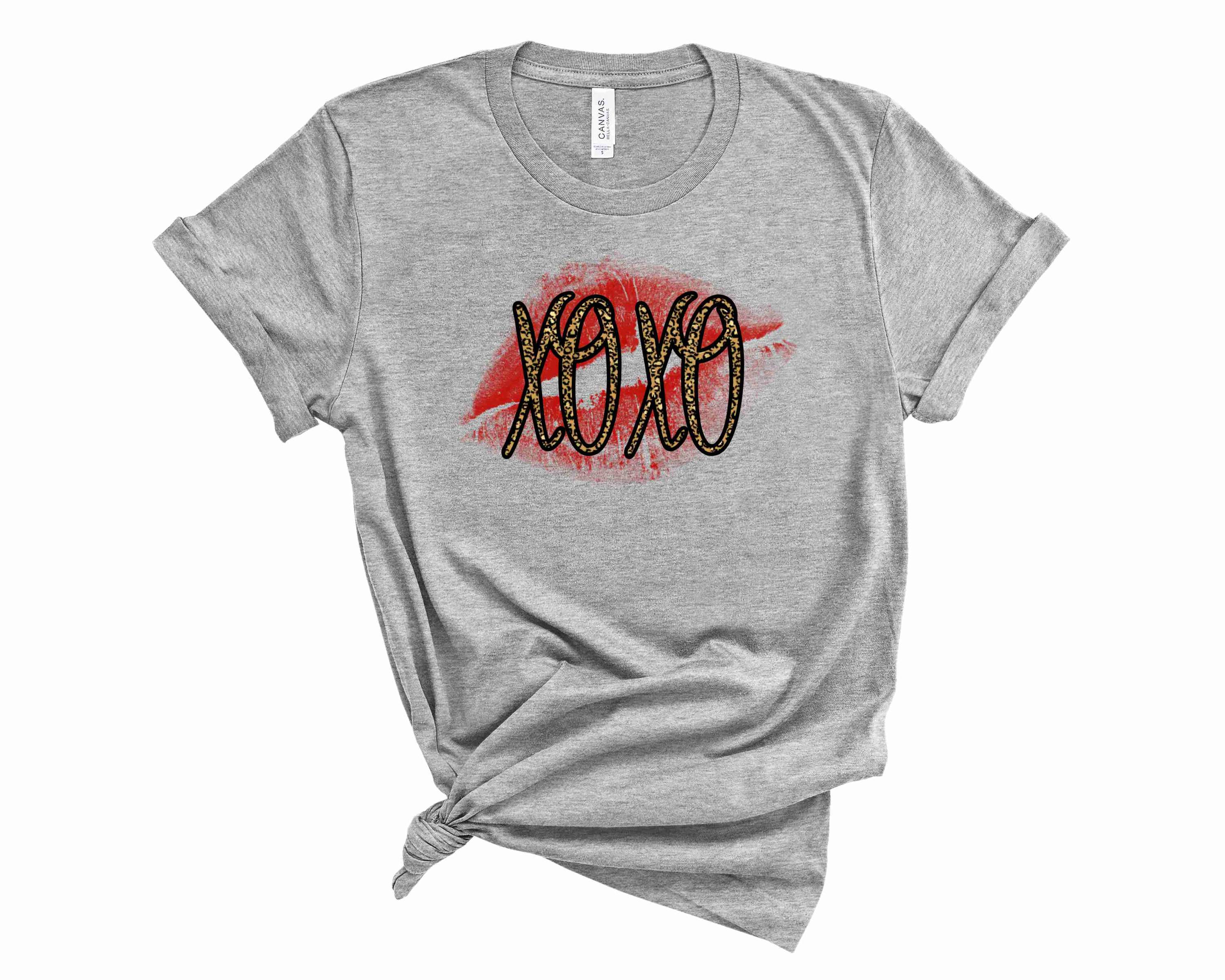 XOXO Leopard Graphic Tee featuring a stylish leopard print design on a unisex t-shirt.