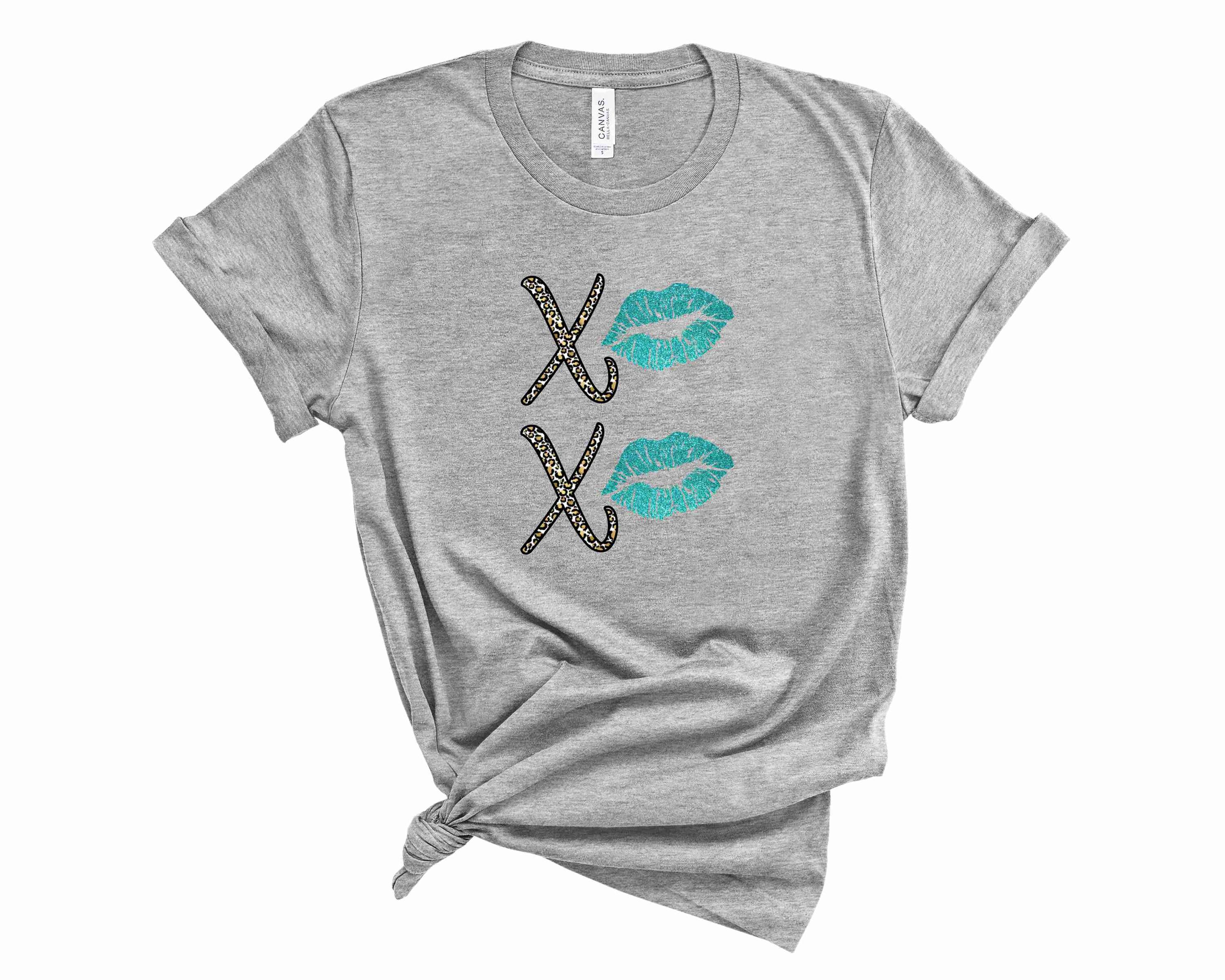 XOXO Lips Graphic Tee featuring a bold lips design on a soft fabric, suitable for unisex wear.