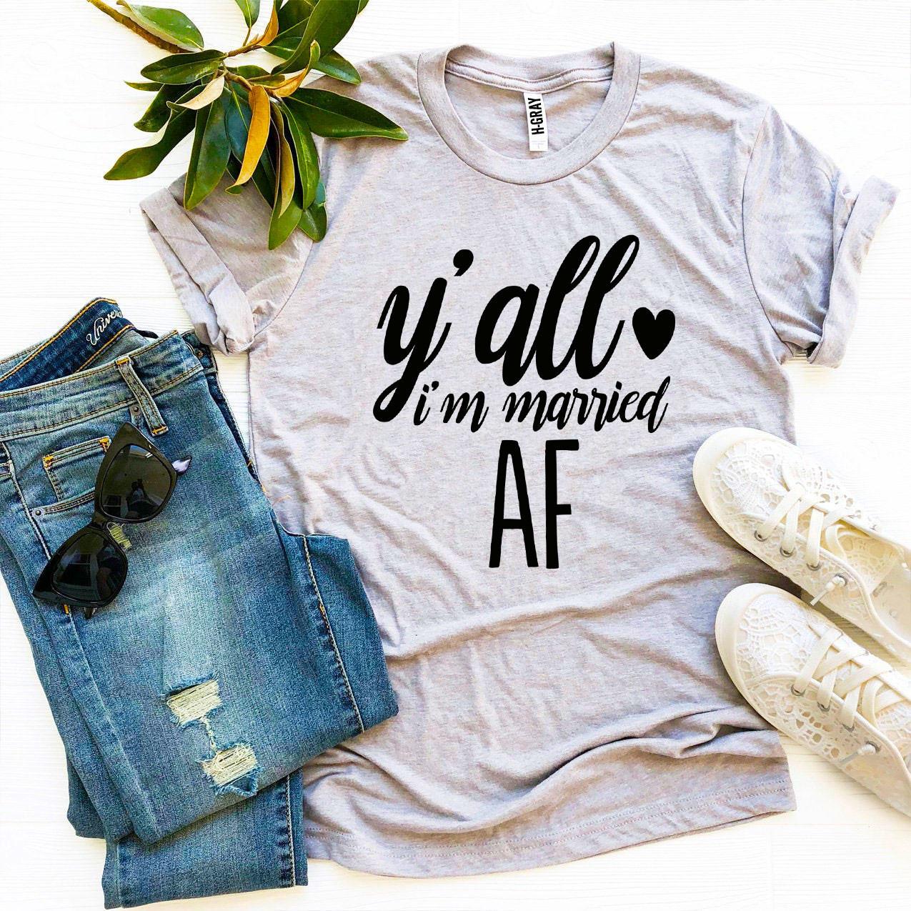 Y’all I’m Married Af T-shirt made of soft ring spun cotton with a stylish print, available in various sizes.