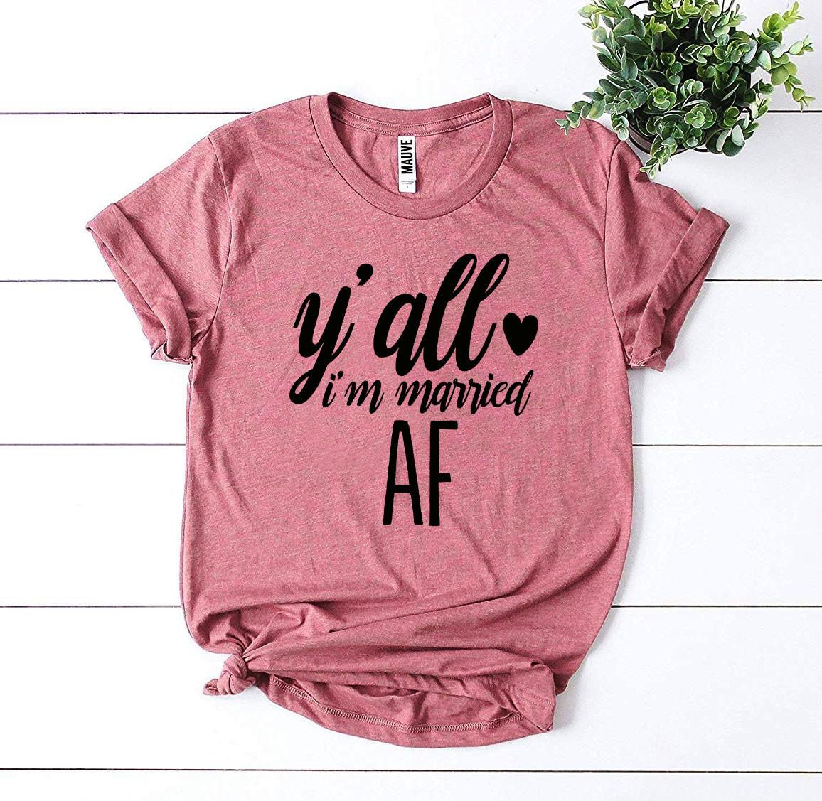 Y’all I’m Married Af T-shirt made of soft ring spun cotton with a stylish print, available in various sizes.