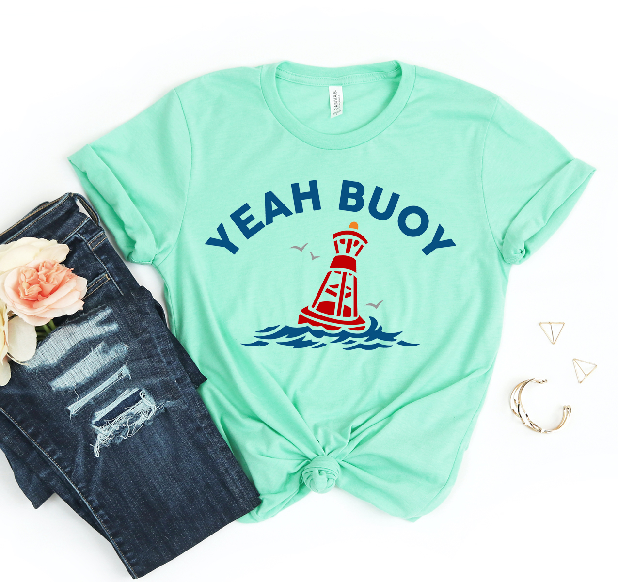 Yeah Buoy T-shirt in various sizes, showcasing its classic unisex design and soft cotton fabric.