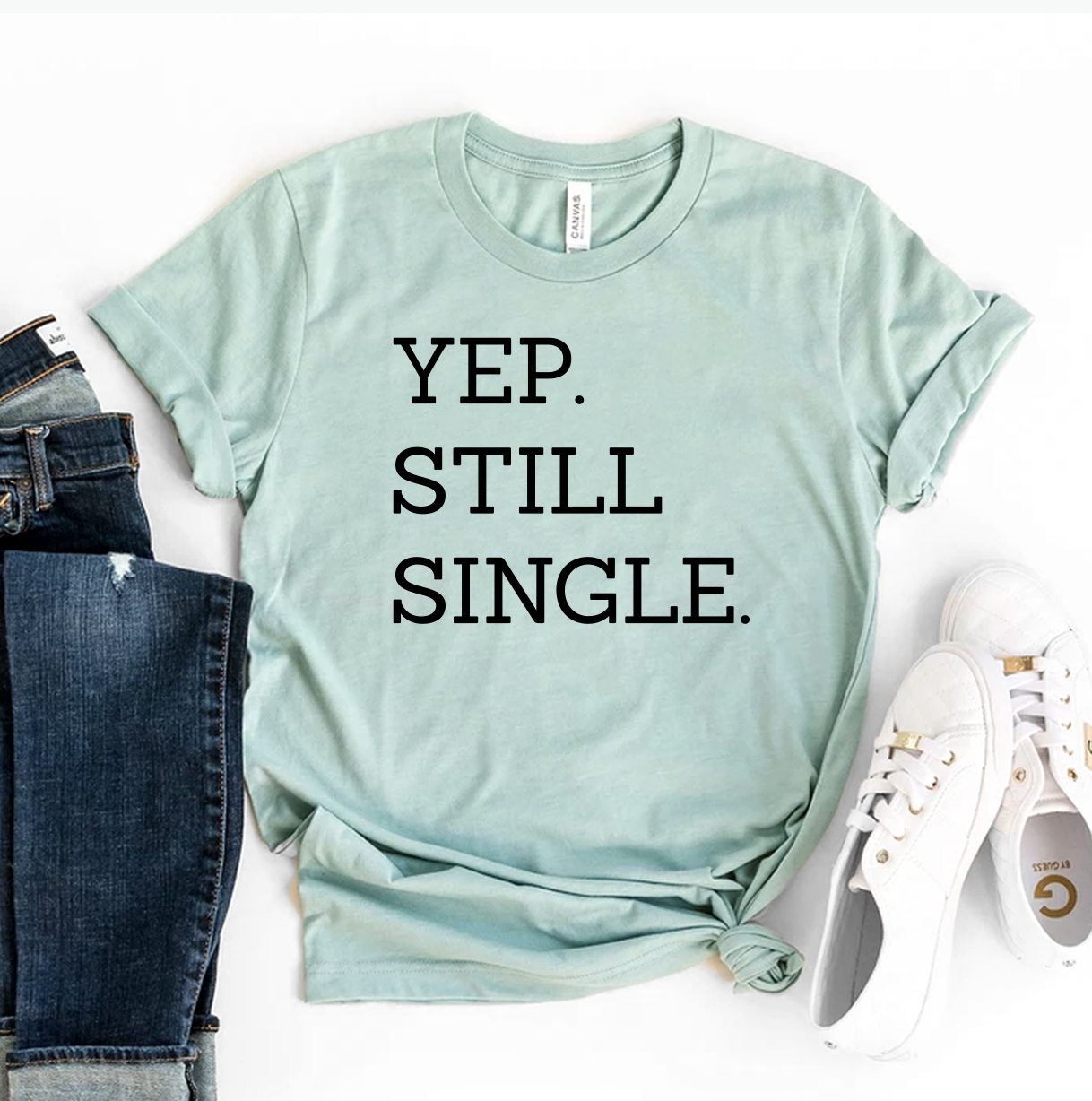 Yep Still Single T-shirt made of premium ring spun cotton with a humorous design, available in various sizes.