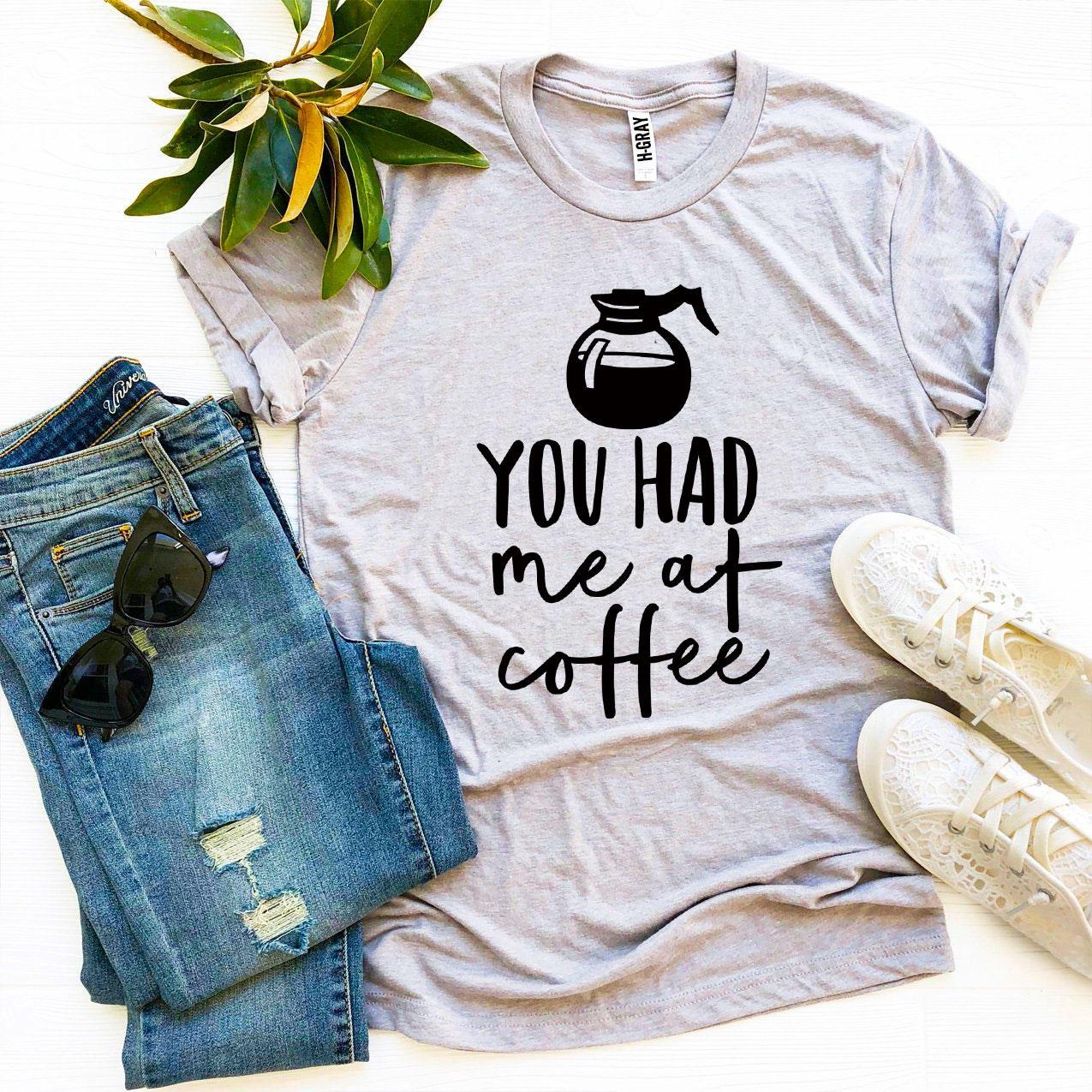 A stylish 'You Had Me At Coffee' T-shirt made from premium ring spun cotton, featuring a vibrant flex print design.