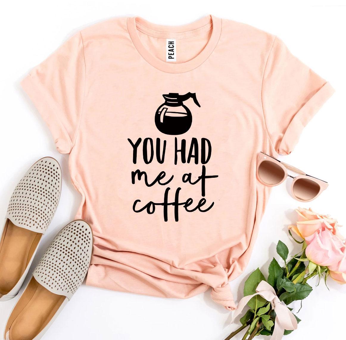 A stylish 'You Had Me At Coffee' T-shirt made from premium ring spun cotton, featuring a vibrant flex print design.