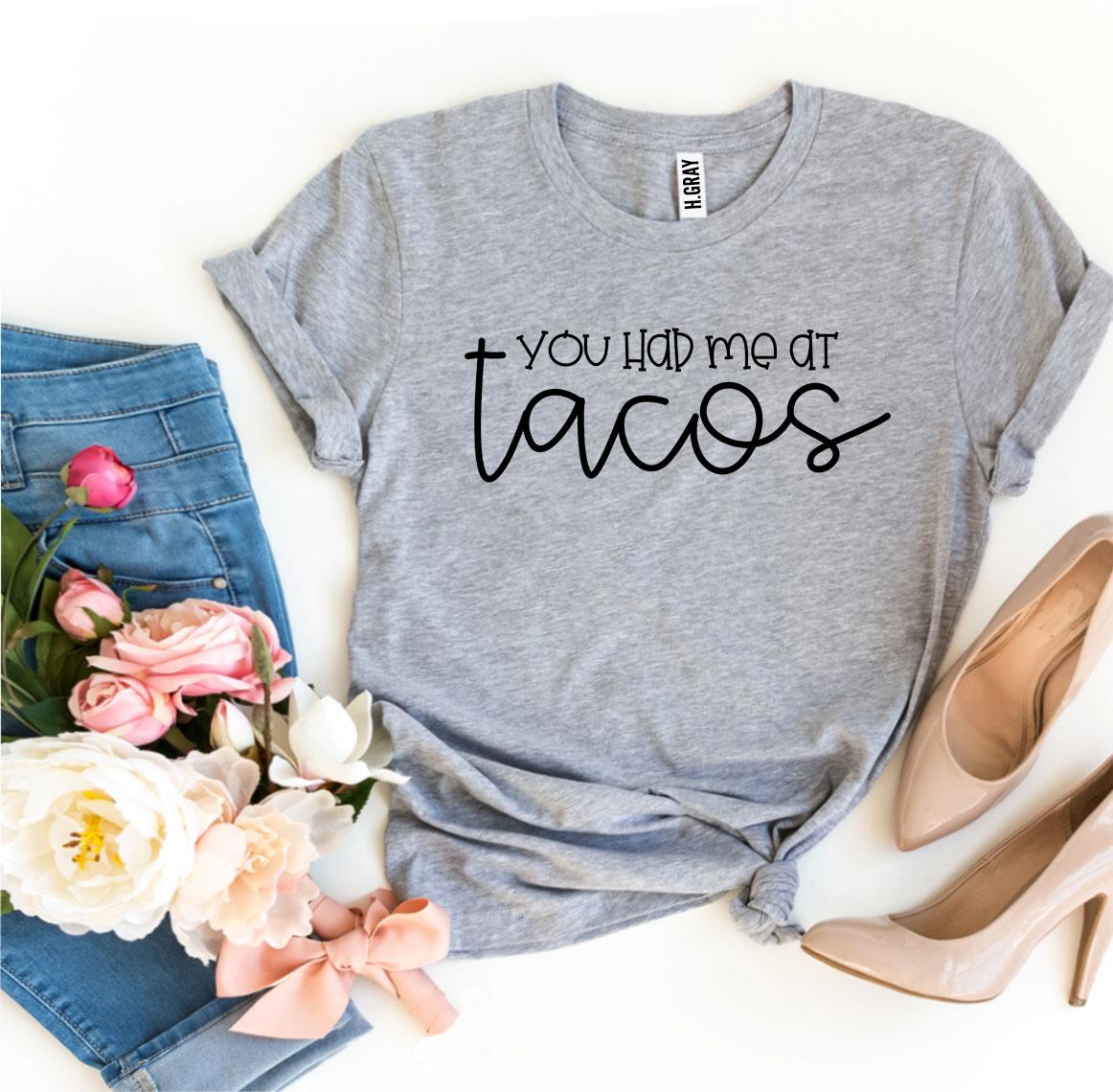 You Had Me At Tacos T-shirt in premium ring spun cotton, featuring a vibrant taco-themed design.