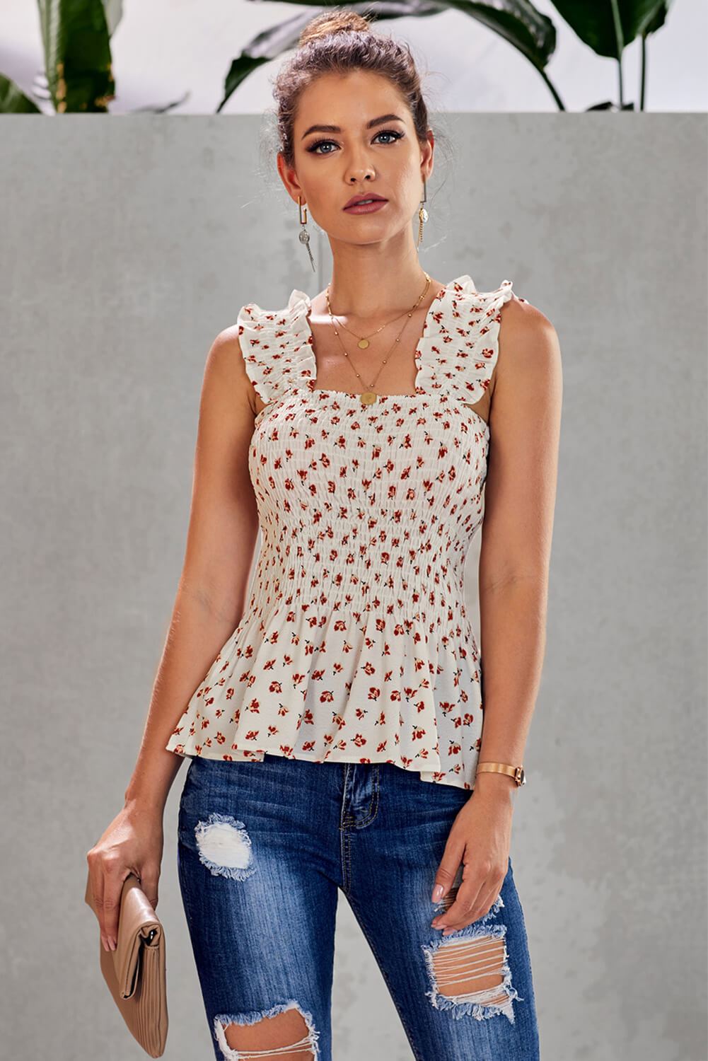 Chic White Floral Smock Tank Top featuring floral print, ruffle details, and elastic straps, perfect for summer wear.