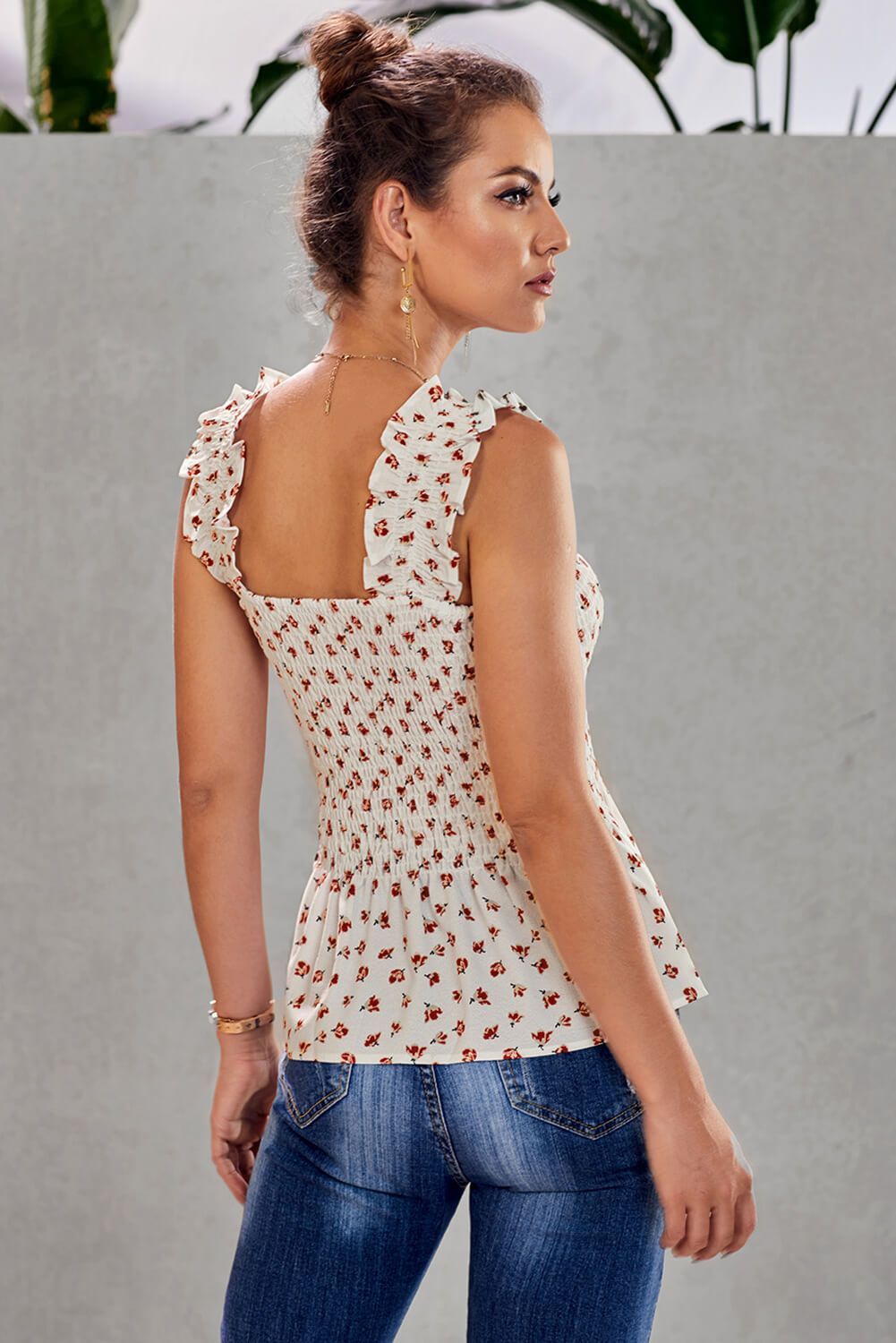 Chic White Floral Smock Tank Top featuring floral print, ruffle details, and elastic straps, perfect for summer wear.