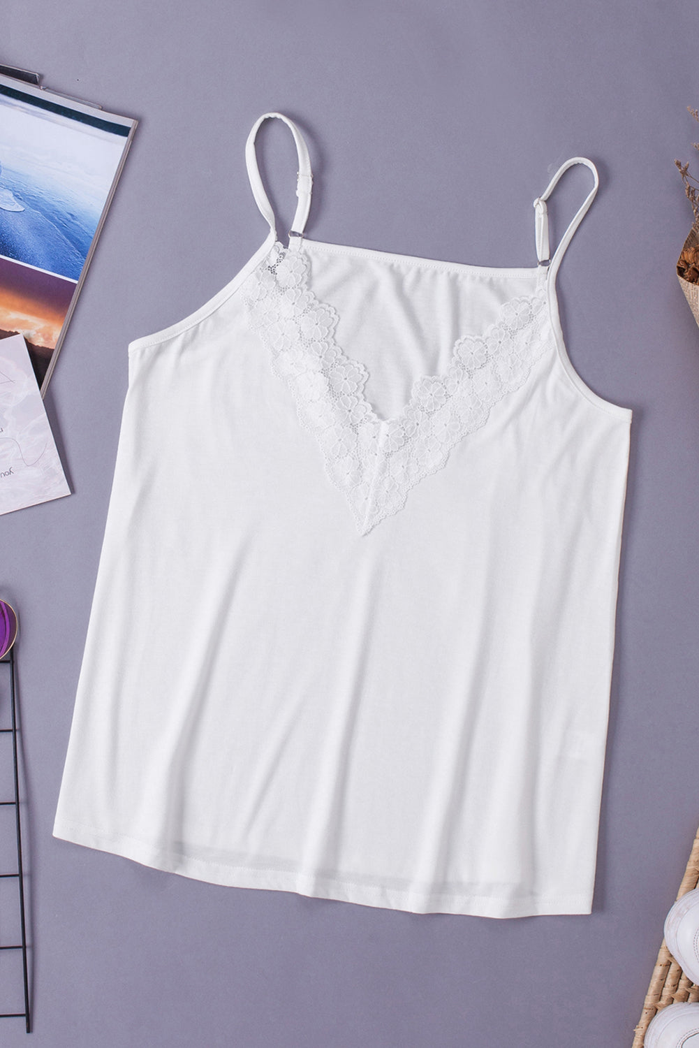 Chic White Lace Camisole Top featuring delicate lace splicing and adjustable spaghetti straps, perfect for summer styling.