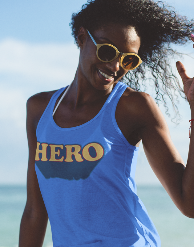 Hero Women Tank Top in various colors, showcasing racer back style and curved back hem.