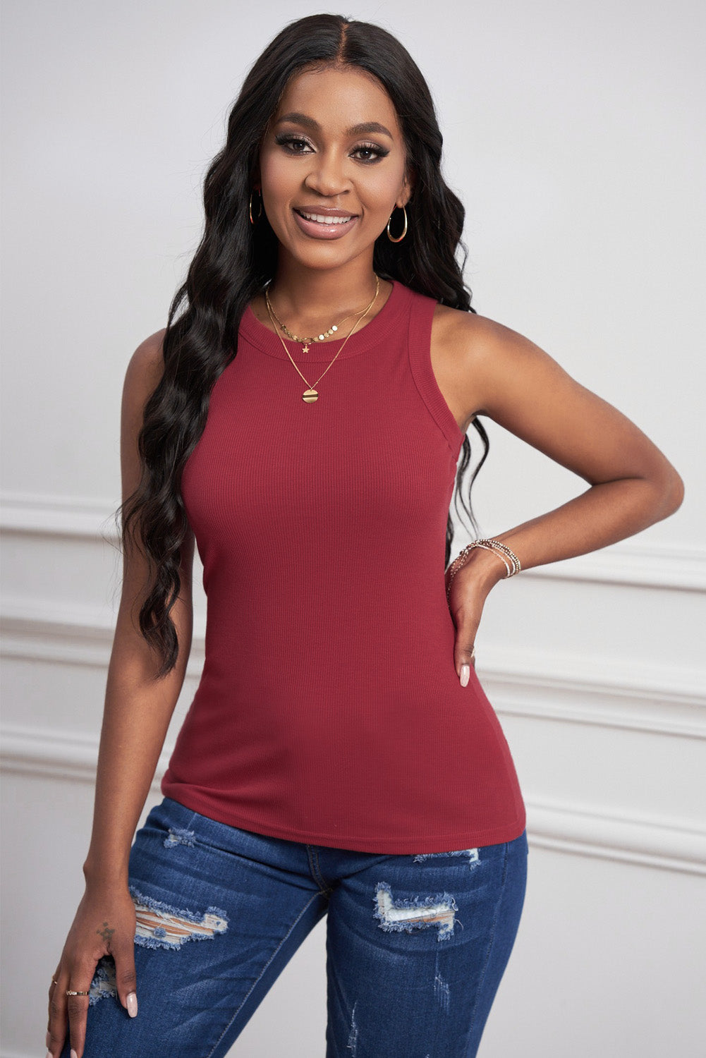 A vibrant red solid ribbed tank top with a round neck and sleeveless design, perfect for summer wear.