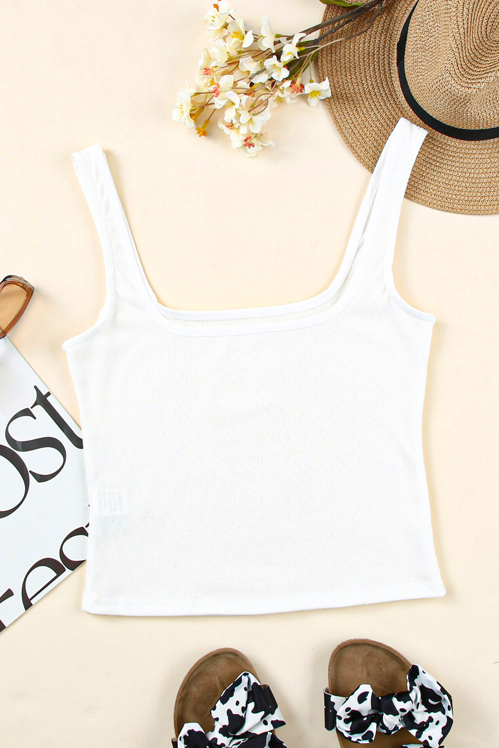 A stylish white ribbed crop tank top featuring a square neckline and a skinny fit, perfect for summer wear.