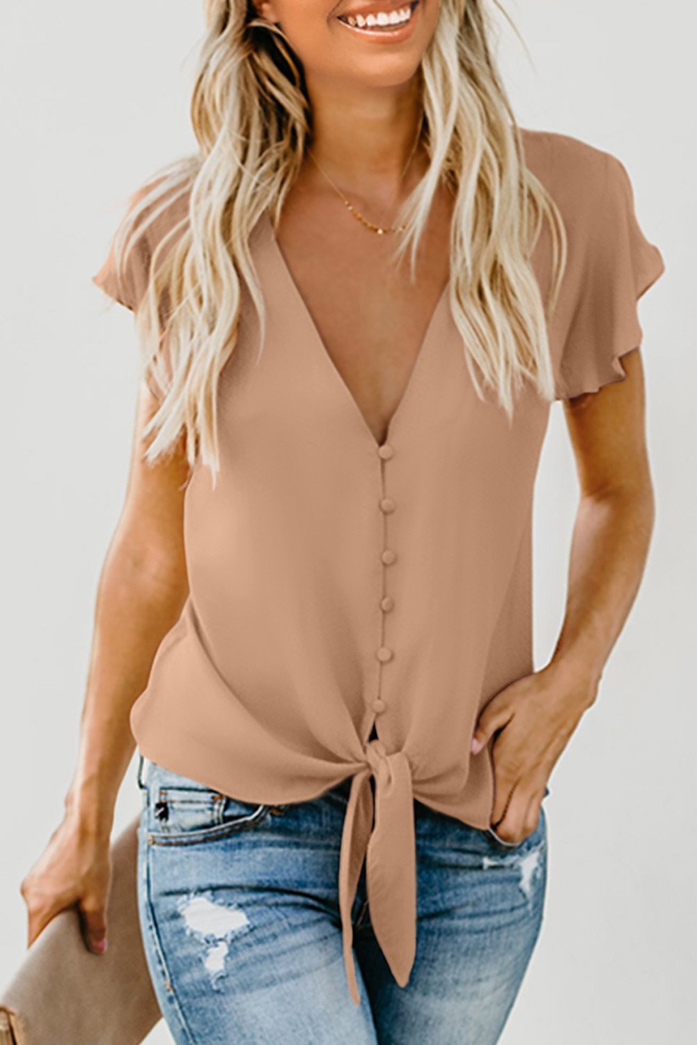 Apricot short sleeve button down tie top with V-neckline, perfect for summer casual wear.