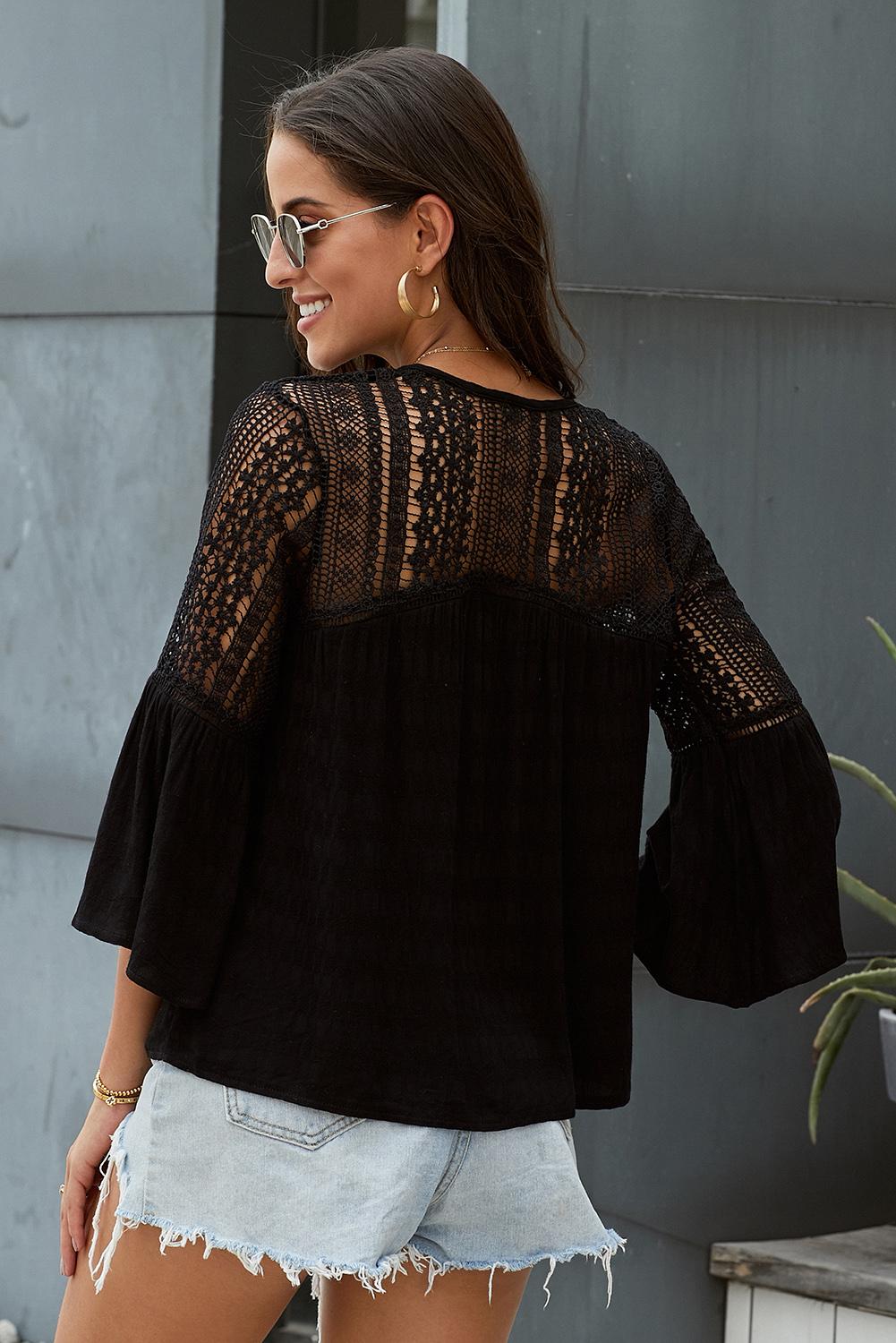 Black The Du Jour Hollow Out Crochet Blouse featuring intricate crochet detailing and flowy bell sleeves, perfect for a bohemian style.