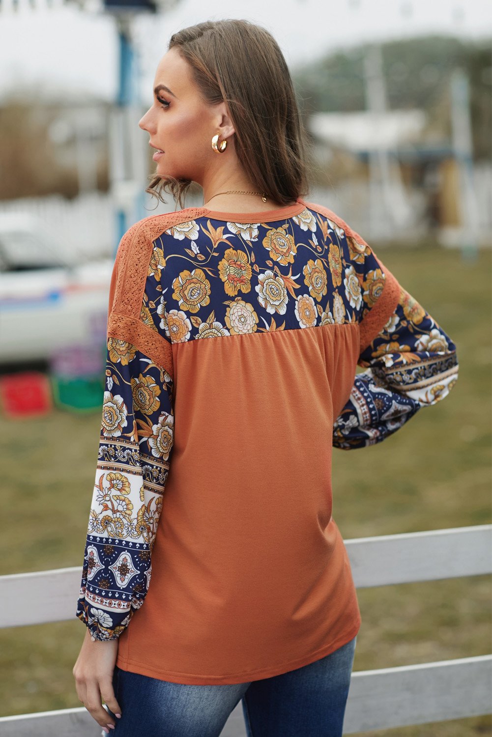 Boho Balloon Sleeve Top featuring retro floral prints and lace details in warm brown color.