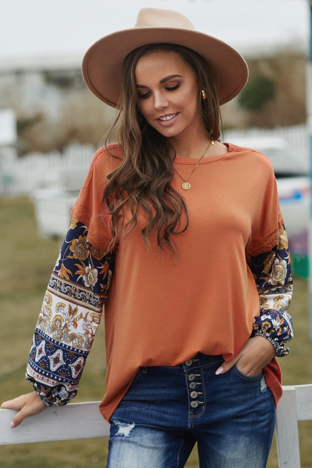 Boho Balloon Sleeve Top featuring retro floral prints and lace details in warm brown color.