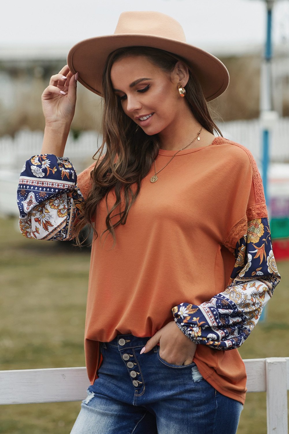 Boho Balloon Sleeve Top featuring retro floral prints and lace details in warm brown color.