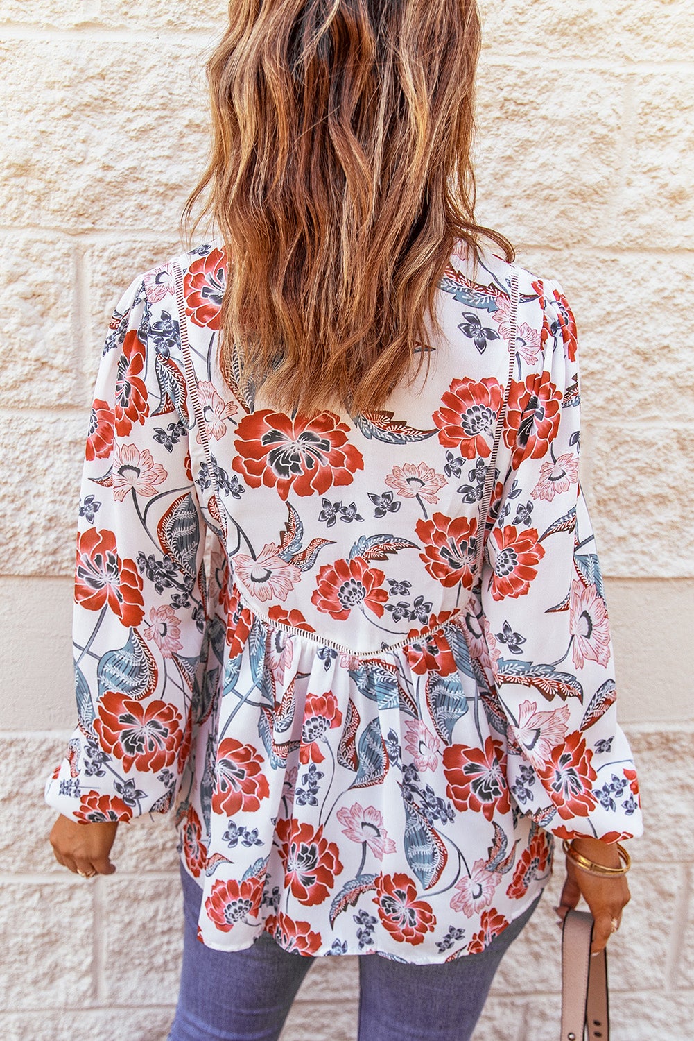 A stylish Bubble Sleeve Floral Blouse featuring a unique floral patchwork design, split v-neck, and bubble sleeves, perfect for casual and dressy occasions.