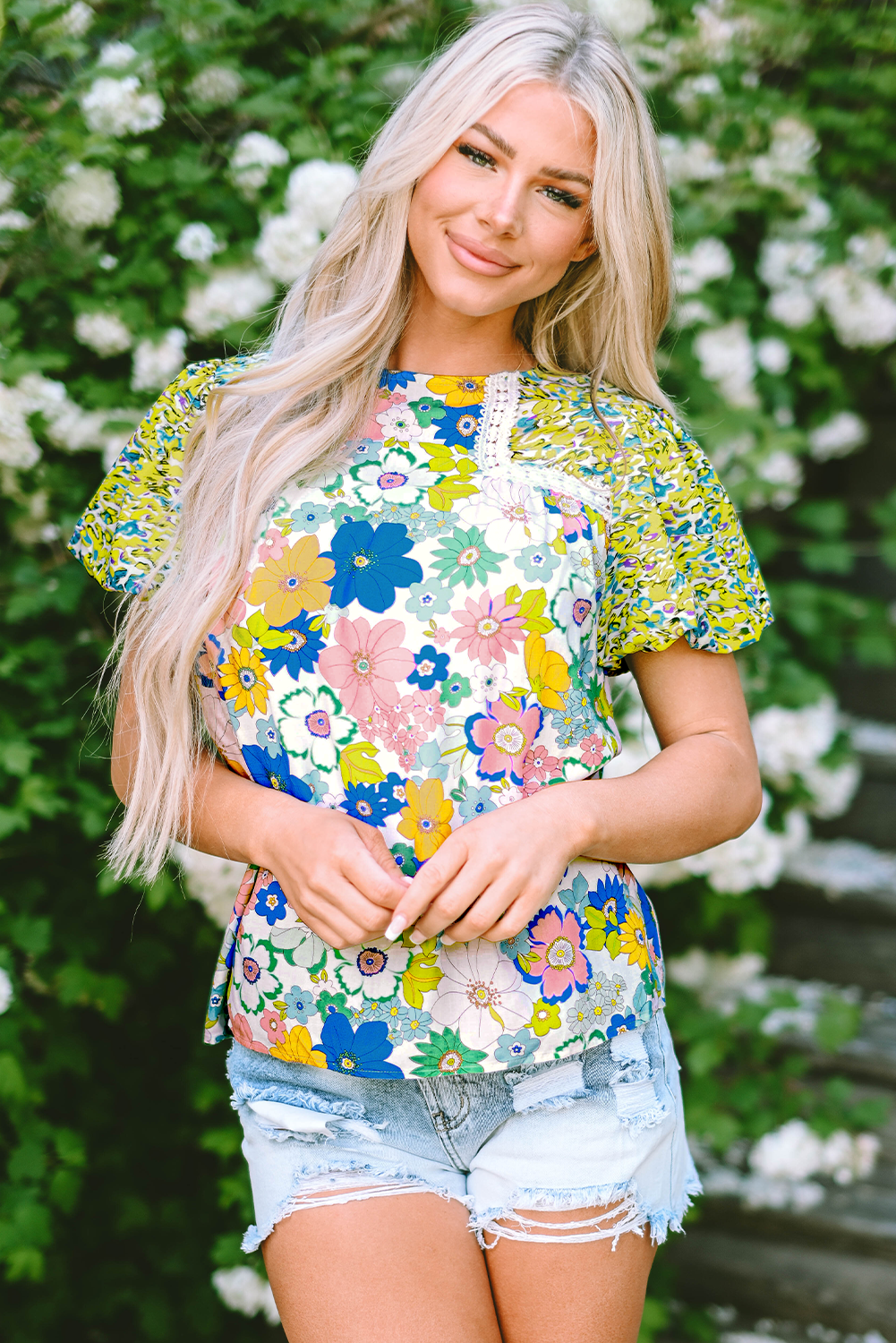 A stylish Bubble Sleeve Lace Trim Floral Blouse featuring a vibrant floral print and delicate lace detailing, perfect for casual and formal occasions.