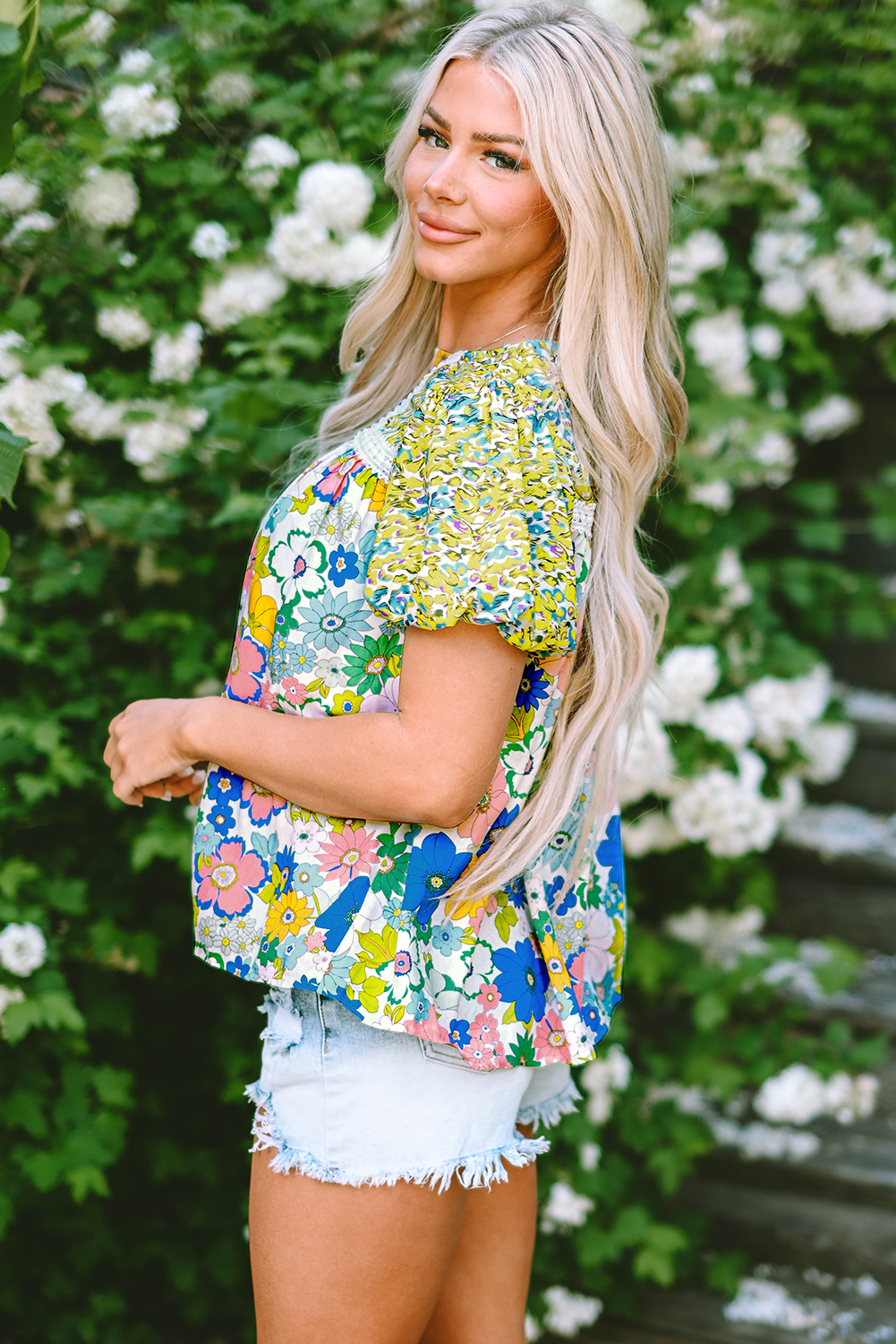 A stylish Bubble Sleeve Lace Trim Floral Blouse featuring a vibrant floral print and delicate lace detailing, perfect for casual and formal occasions.