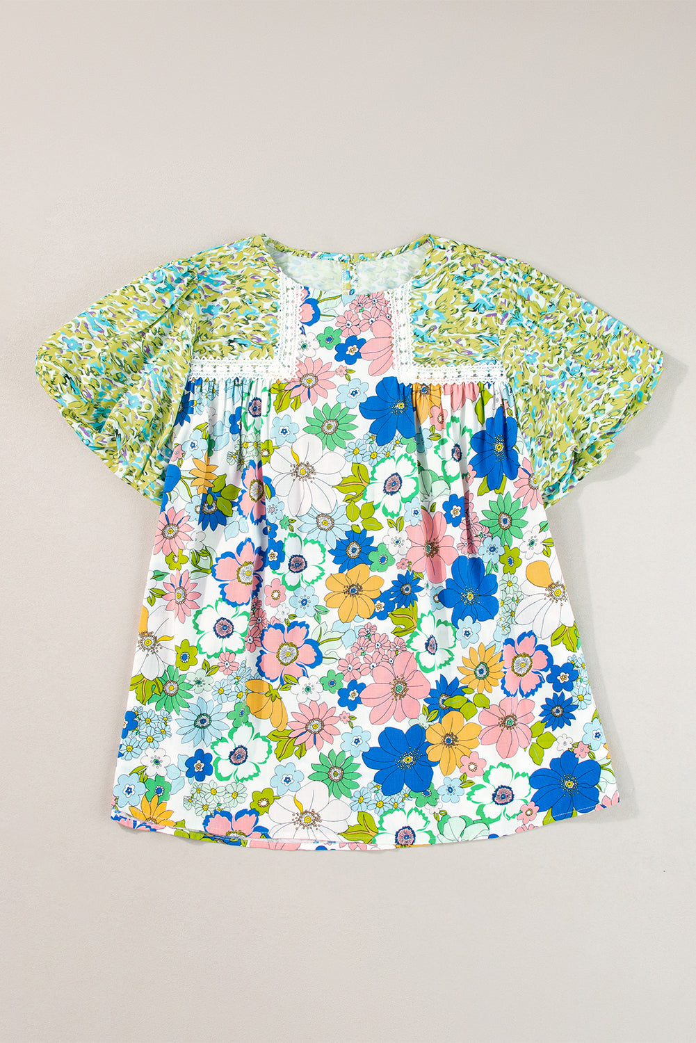 A stylish Bubble Sleeve Lace Trim Floral Blouse featuring a vibrant floral print and delicate lace detailing, perfect for casual and formal occasions.