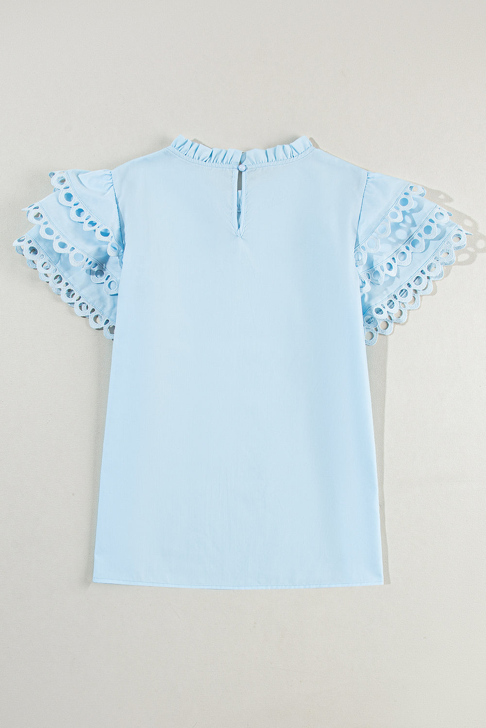 Elegant Cap Sleeve Filled Neck Blouse in Beau Blue with ruffle details and stand neck design, perfect for various occasions.