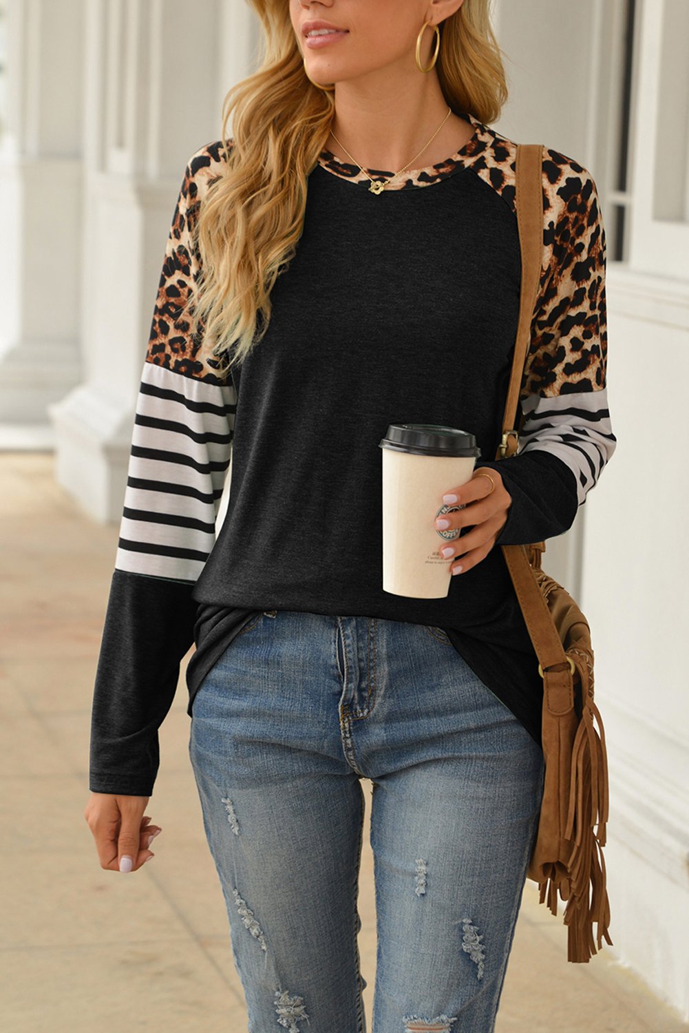 Casual long sleeve top featuring leopard print, striped patterns, and color block design in black and gray.