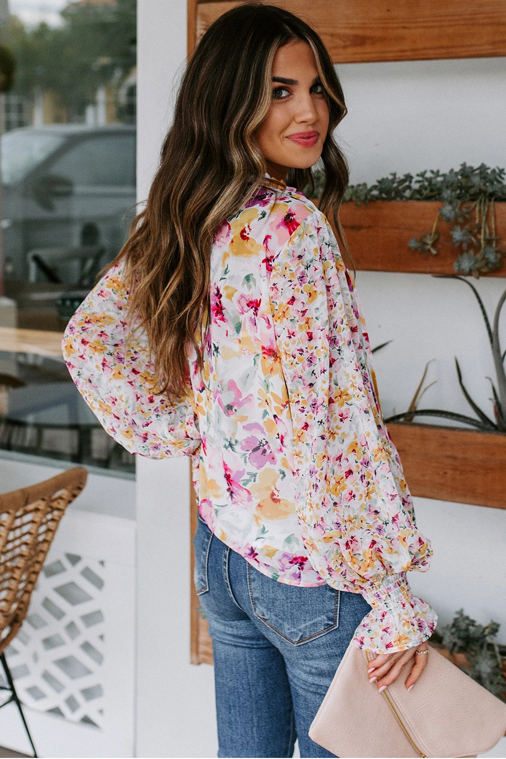 Chic Cakewalk Floral Smocked Long Sleeve Blouse in pink with ruffled neckline and billowy sleeves, perfect for spring and autumn.