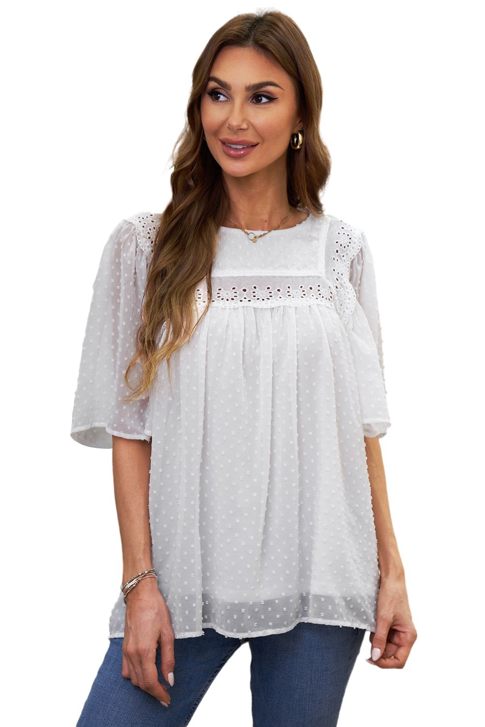 Chic white babydoll top with flutter sleeves and sheer textured design, perfect for summer wear.