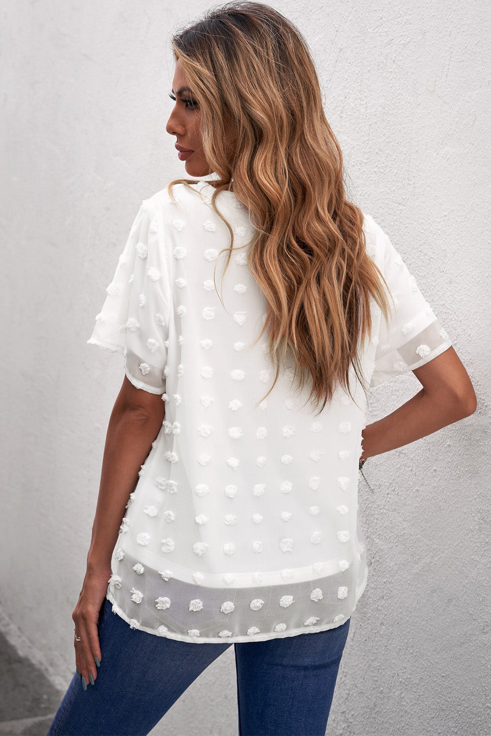 Chic White Swiss Dot Texture Round Neck Short Sleeve Top displayed on a mannequin, showcasing its elegant design and soft fabric.