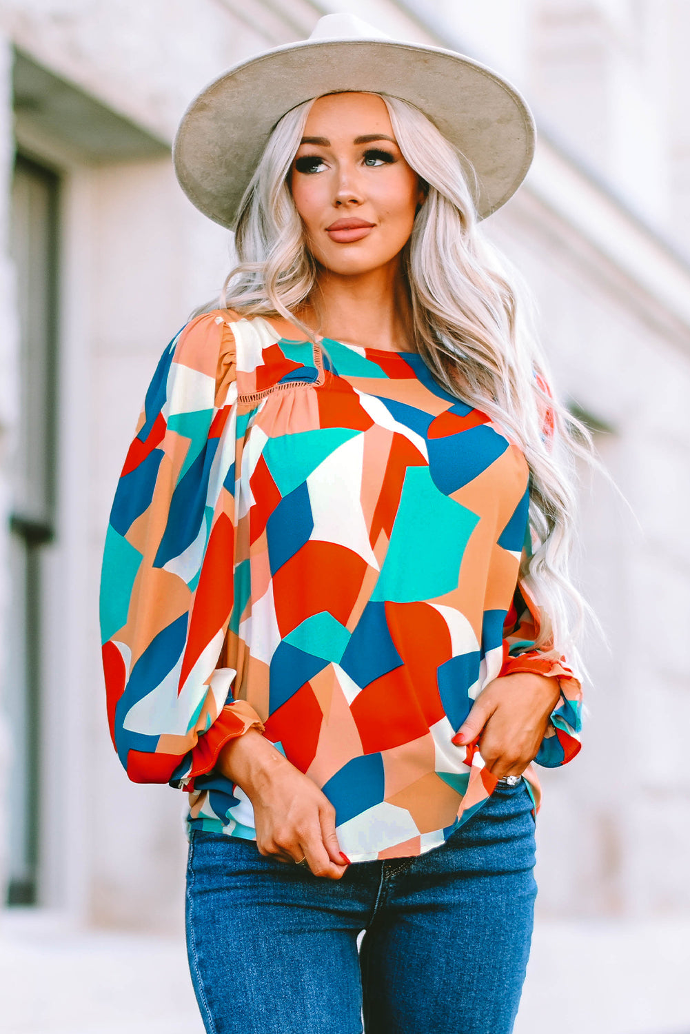 Elegant Crewneck Ruffled Puff Sleeve Blouse with ruffled sleeves and a fitted silhouette, perfect for spring and summer events.