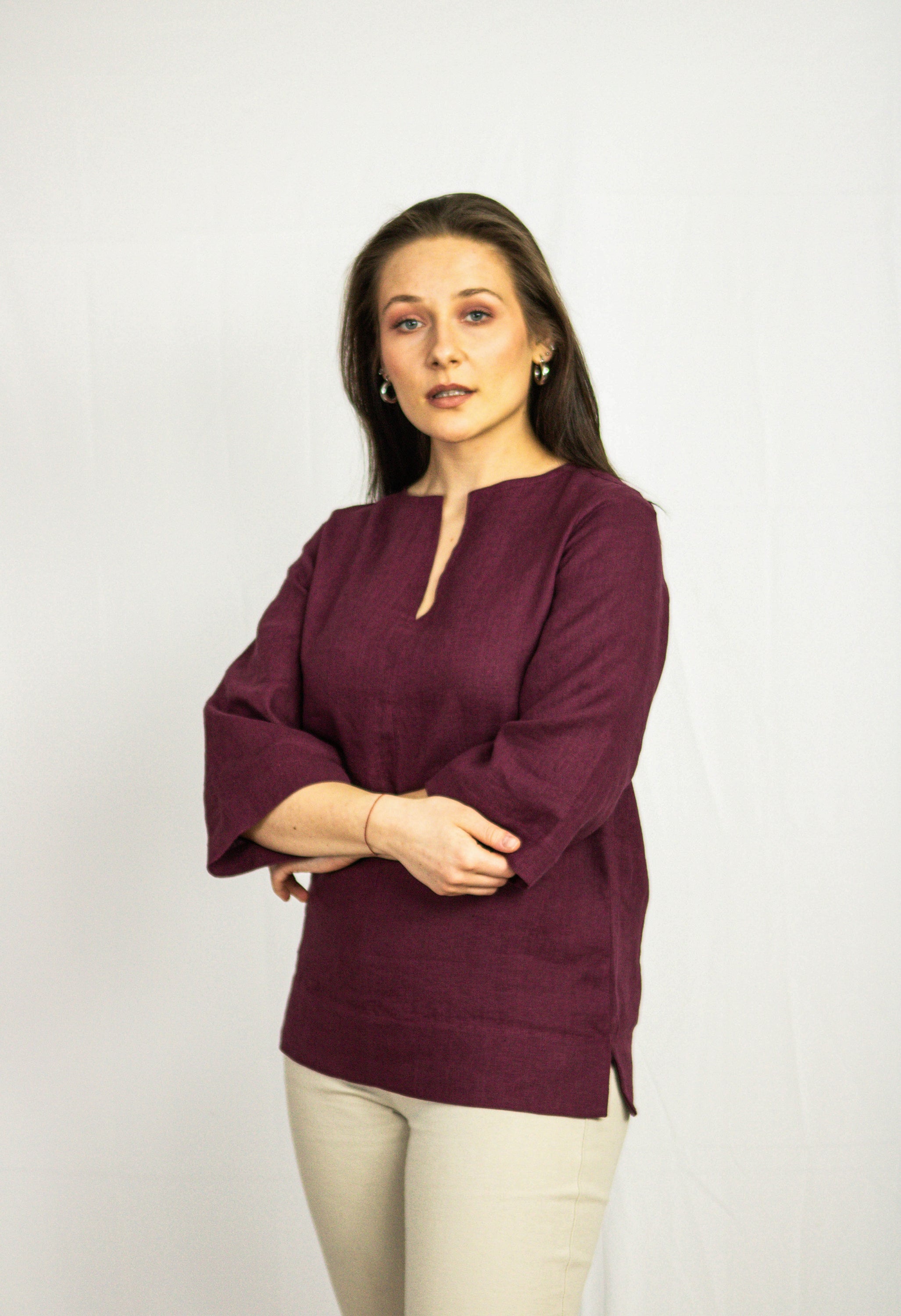 Dark Plum linen oversize top showcasing its elegant design and quality stitching, perfect for casual and holiday wear.