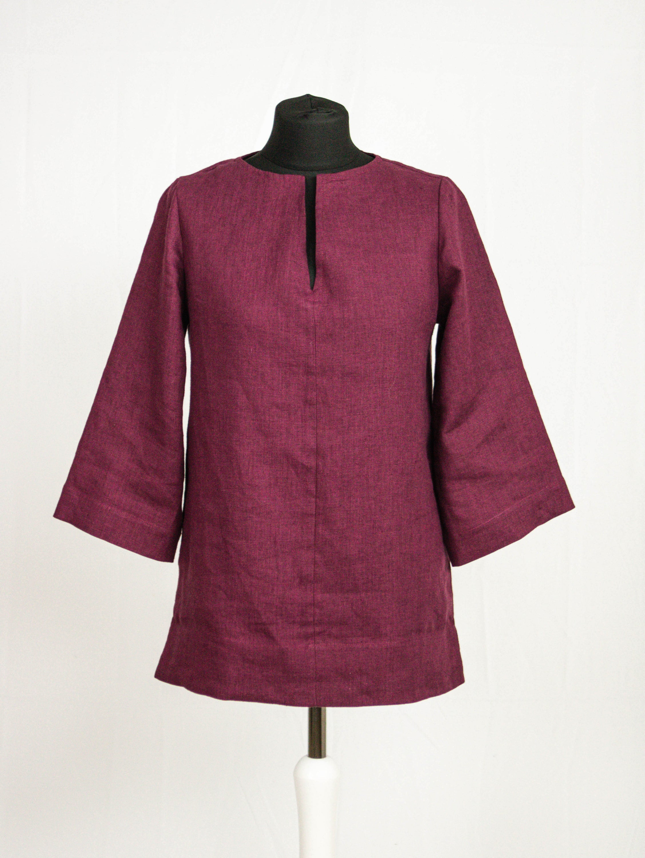 Dark Plum linen oversize top showcasing its elegant design and quality stitching, perfect for casual and holiday wear.