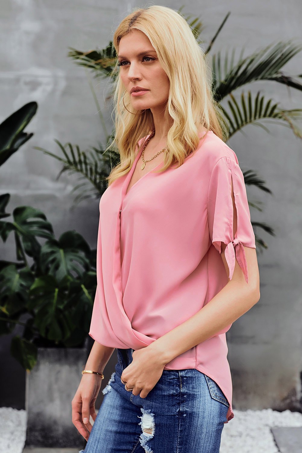 Elegant Pink Charismatic Drape Short Sleeve Blouse with v-neckline and tie sleeves, perfect for summer occasions.