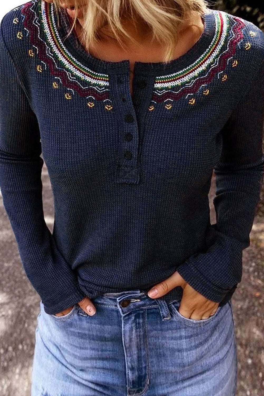 Embroidered Waffle Top featuring tribal embroidery, round neck, and long sleeves, made from textured waffle knit fabric.