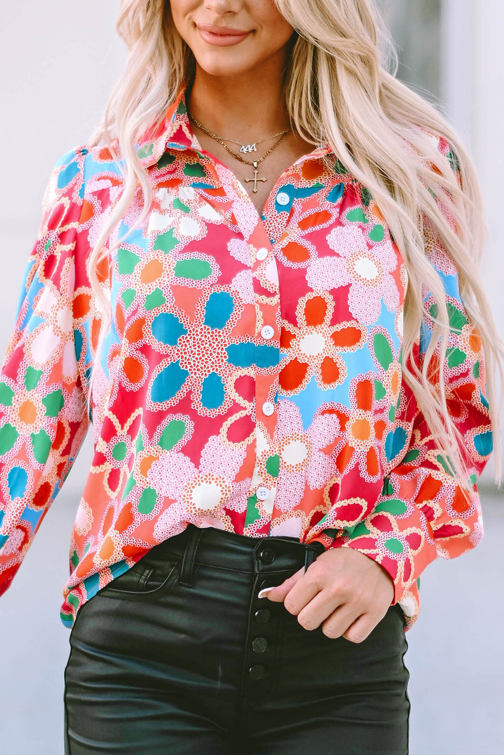 A stylish Floral Print Bubble Sleeve Shirt featuring vibrant floral patterns and elegant bubble sleeves, perfect for casual or formal occasions.