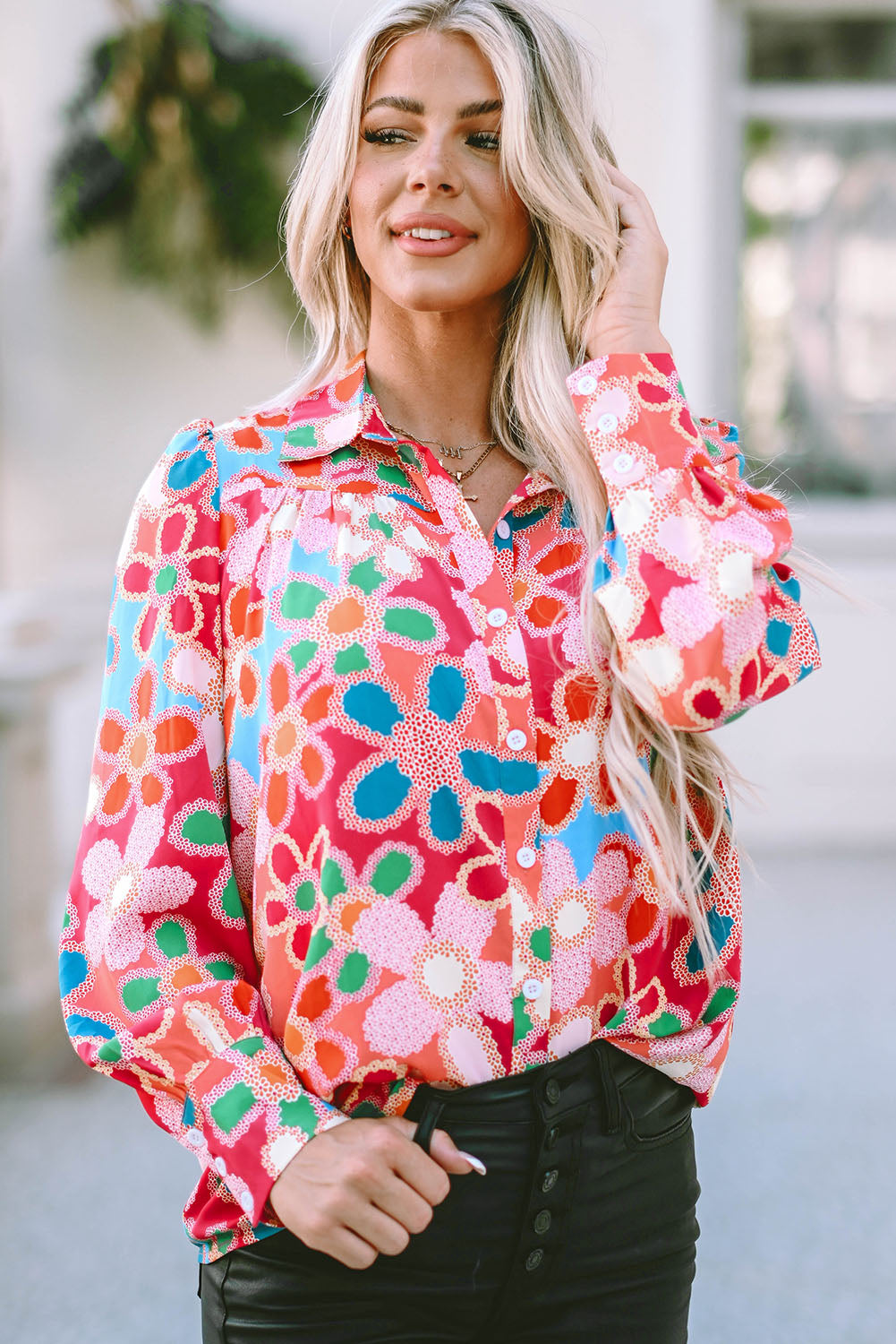 A stylish Floral Print Bubble Sleeve Shirt featuring vibrant floral patterns and elegant bubble sleeves, perfect for casual or formal occasions.