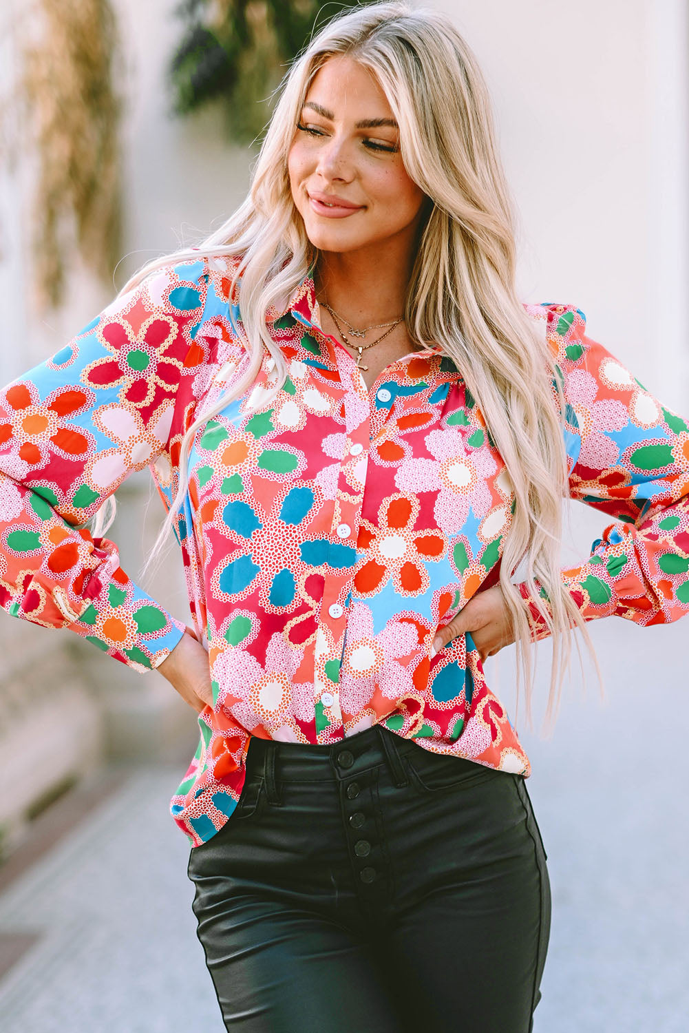 A stylish Floral Print Bubble Sleeve Shirt featuring vibrant floral patterns and elegant bubble sleeves, perfect for casual or formal occasions.