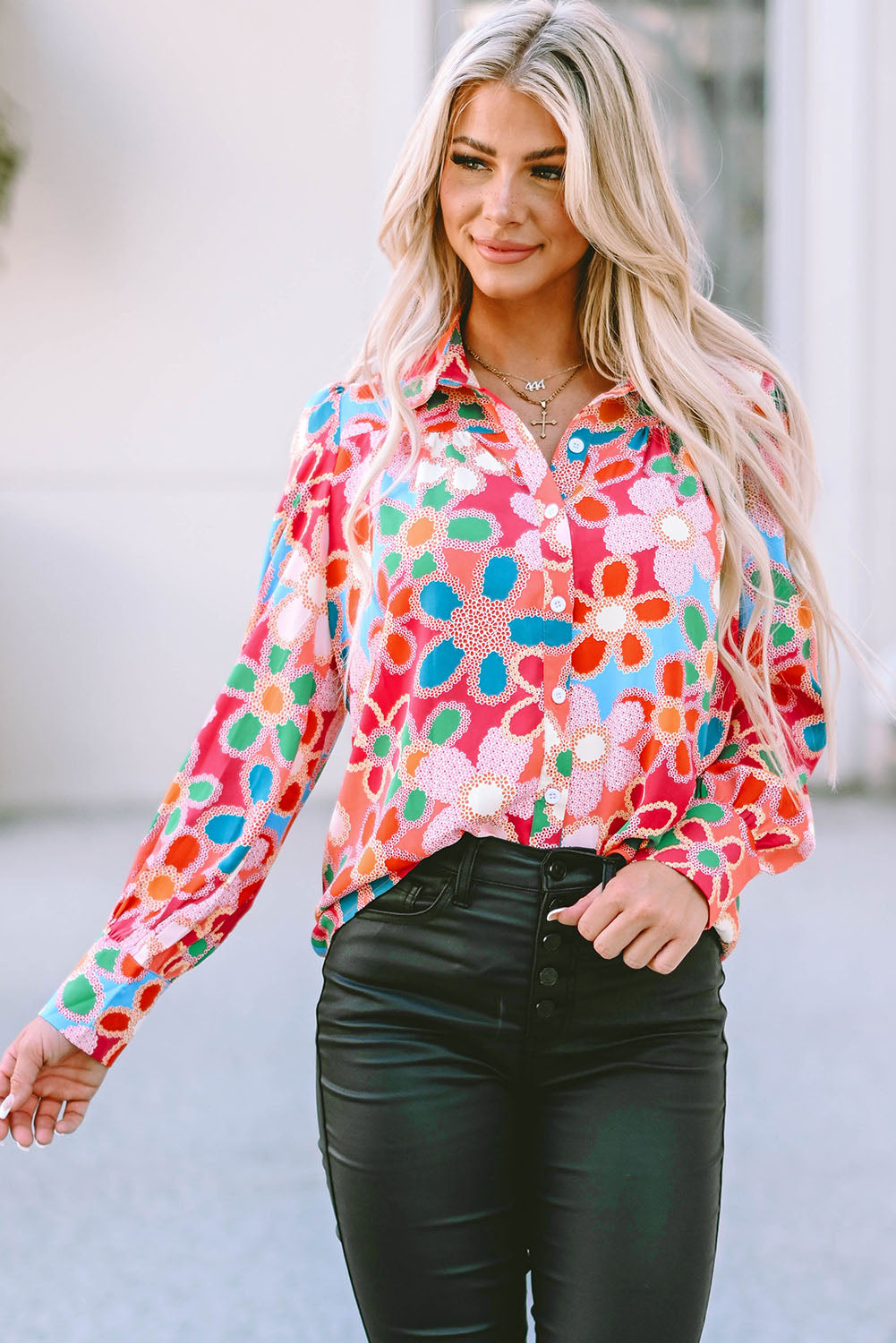 A stylish Floral Print Bubble Sleeve Shirt featuring vibrant floral patterns and elegant bubble sleeves, perfect for casual or formal occasions.