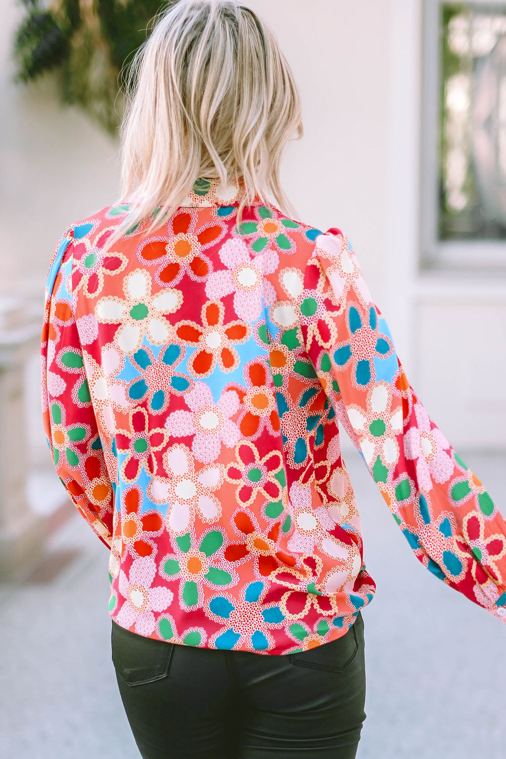 A stylish Floral Print Bubble Sleeve Shirt featuring vibrant floral patterns and elegant bubble sleeves, perfect for casual or formal occasions.