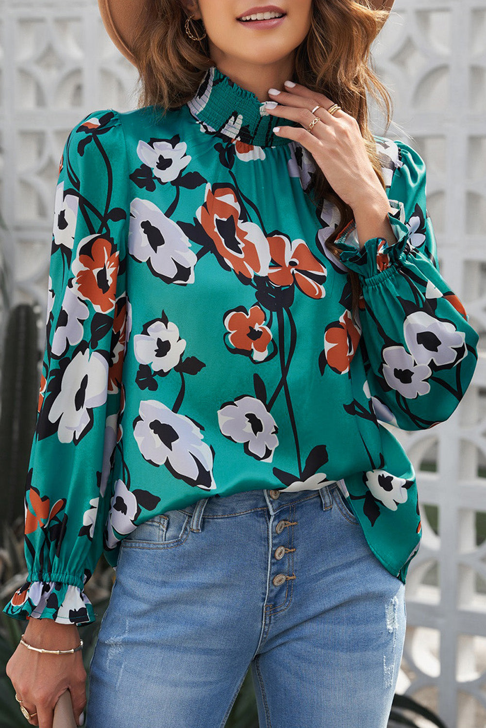 A stylish Floral Print Mock Neck Blouse featuring vibrant floral patterns, bubble sleeves, and ruffle cuffs, perfect for casual occasions.