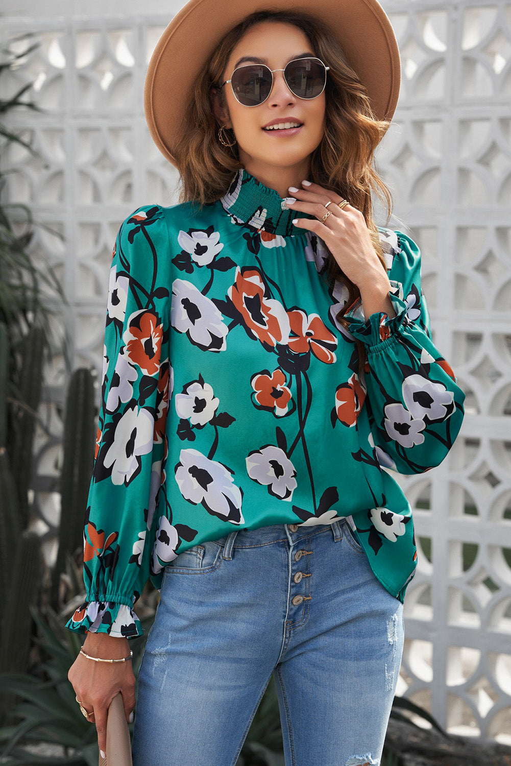 A stylish Floral Print Mock Neck Blouse featuring vibrant floral patterns, bubble sleeves, and ruffle cuffs, perfect for casual occasions.