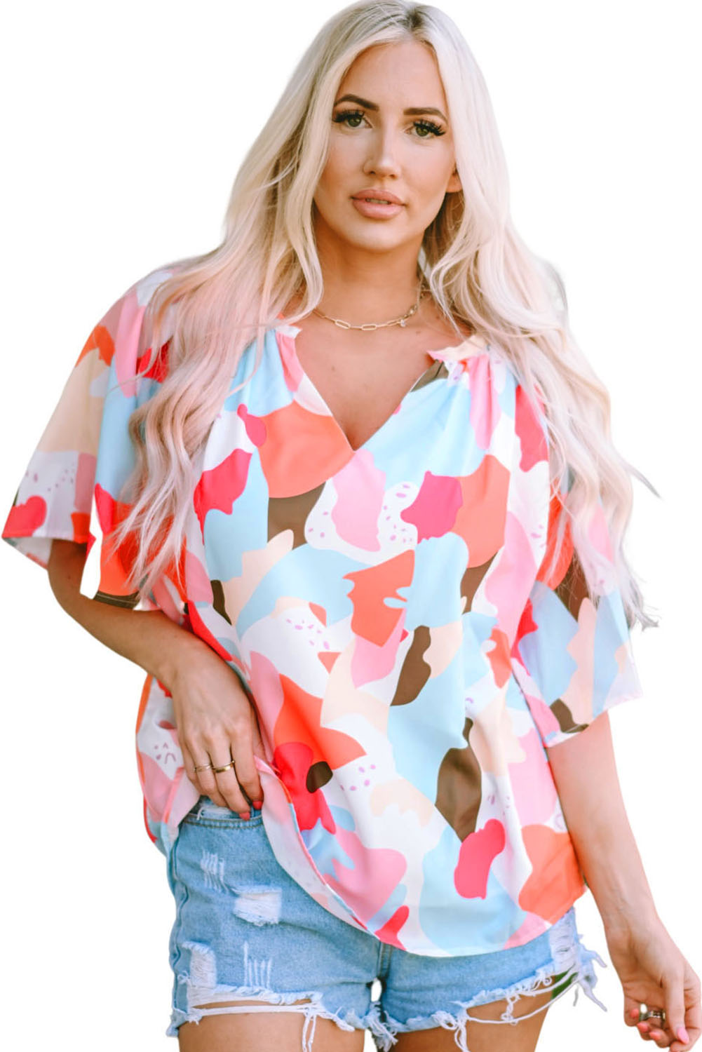 A stylish Floral Print V Neck Half Sleeve Blouse featuring a vibrant floral pattern, wide sleeves, and a flattering V-neckline, perfect for warm weather.