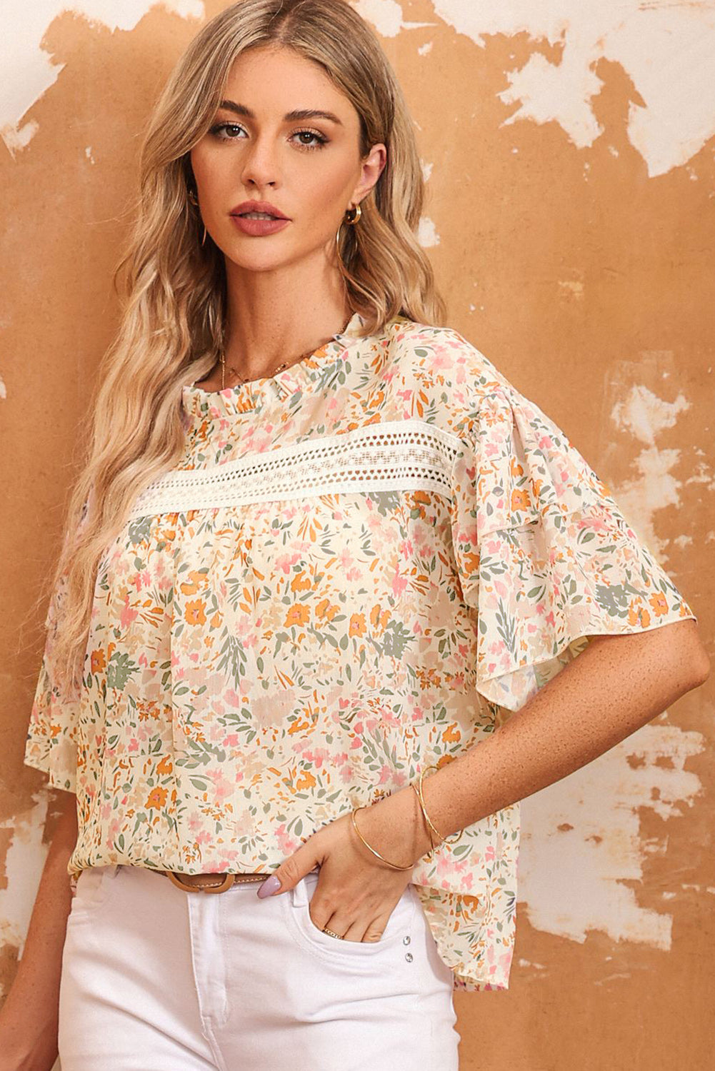 Floral Print Wide Ruffle Blouse featuring wide ruffle sleeves and lace splicing details, perfect for warm weather.