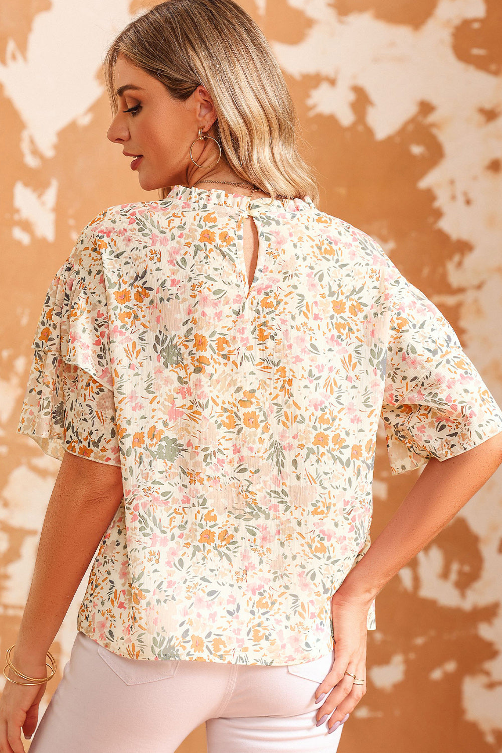 Floral Print Wide Ruffle Blouse featuring wide ruffle sleeves and lace splicing details, perfect for warm weather.